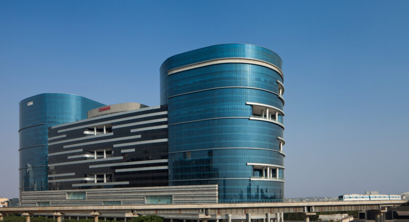 The glass façade allows natural light to enter the offices while offering magnificent views of Gurugram.